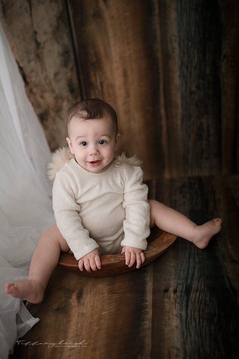 boy in bowl milestone photography in florida