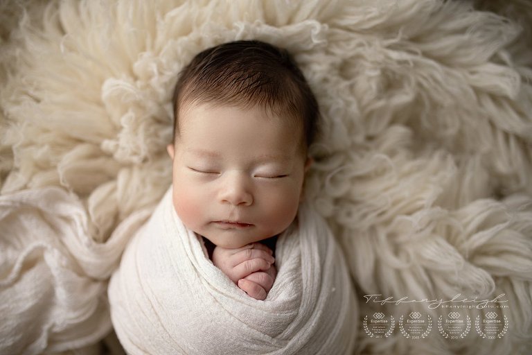 baby on flokati wrapped session gainesville florida