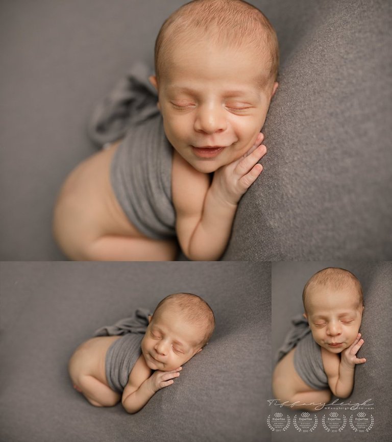 posed newborn baby smiling