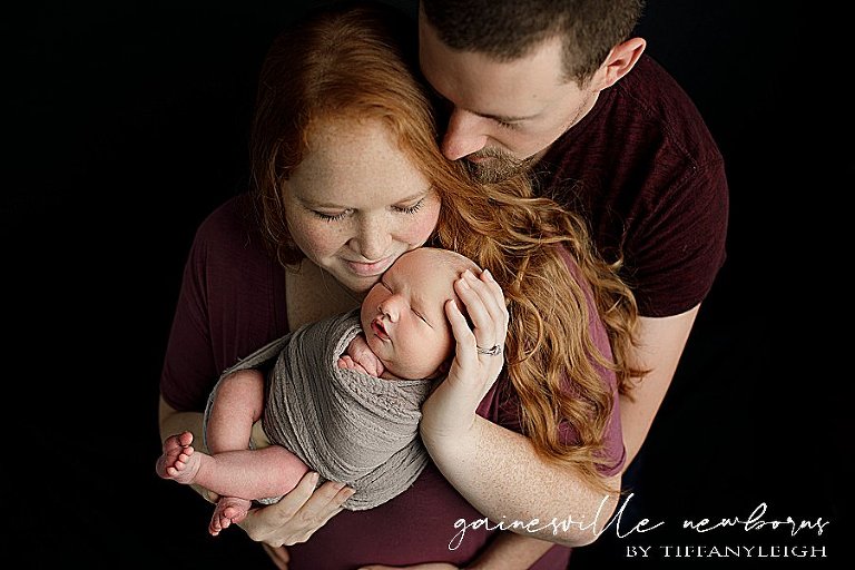 mom and dad together loving baby florida newberry