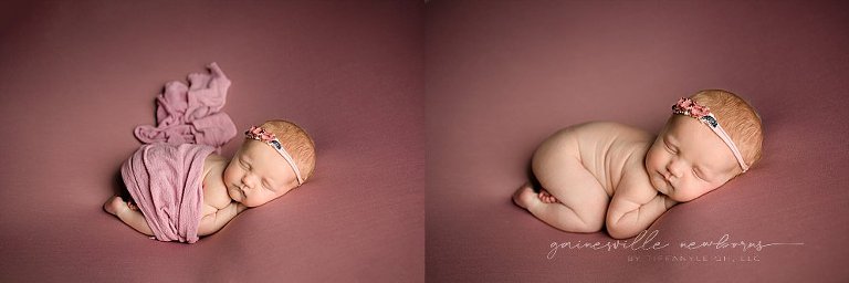 newborn girl on pink red hair