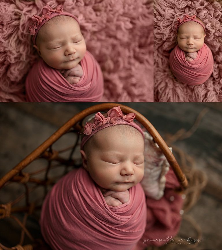 Baby girl swaddled in pink