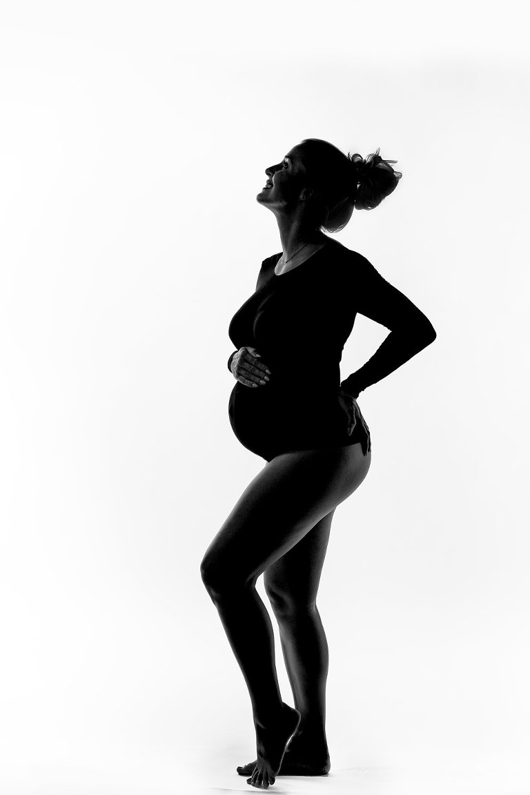 backlit silhouette pregancy 