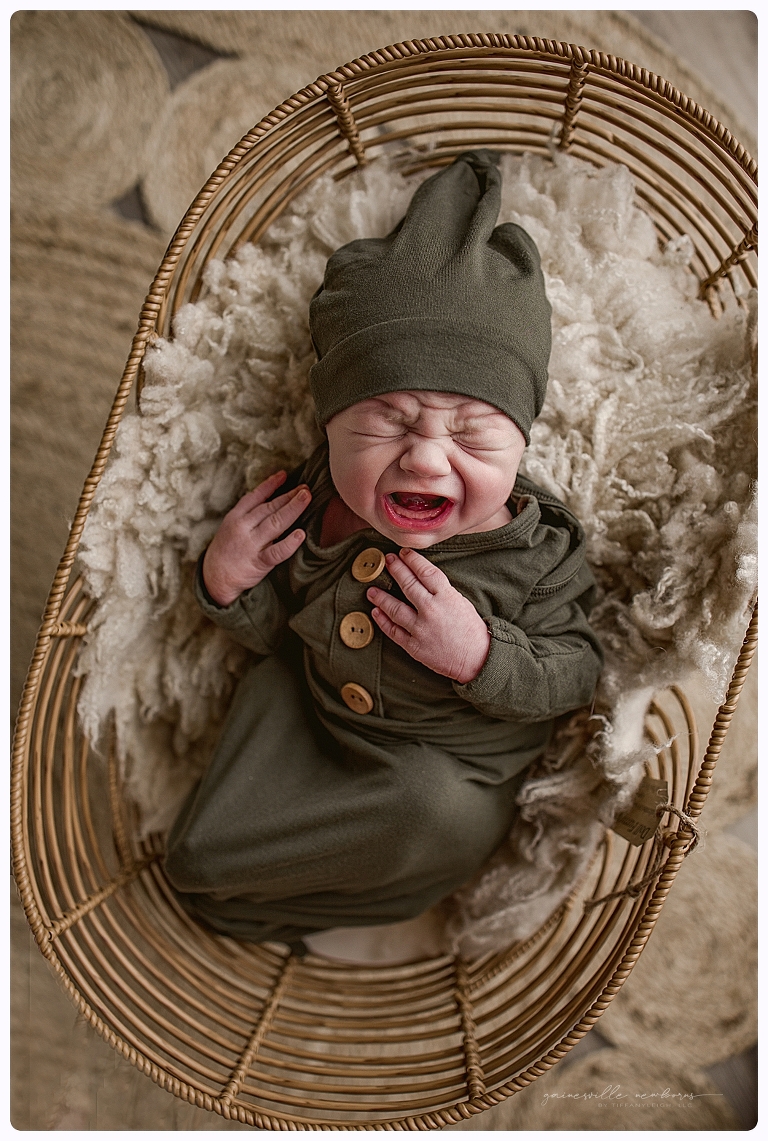 Baby in boho prop University of Florida Newborn 