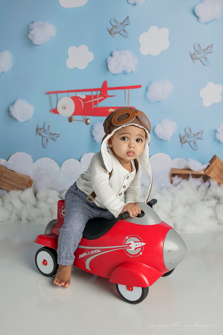 baby riding first plane for photo session